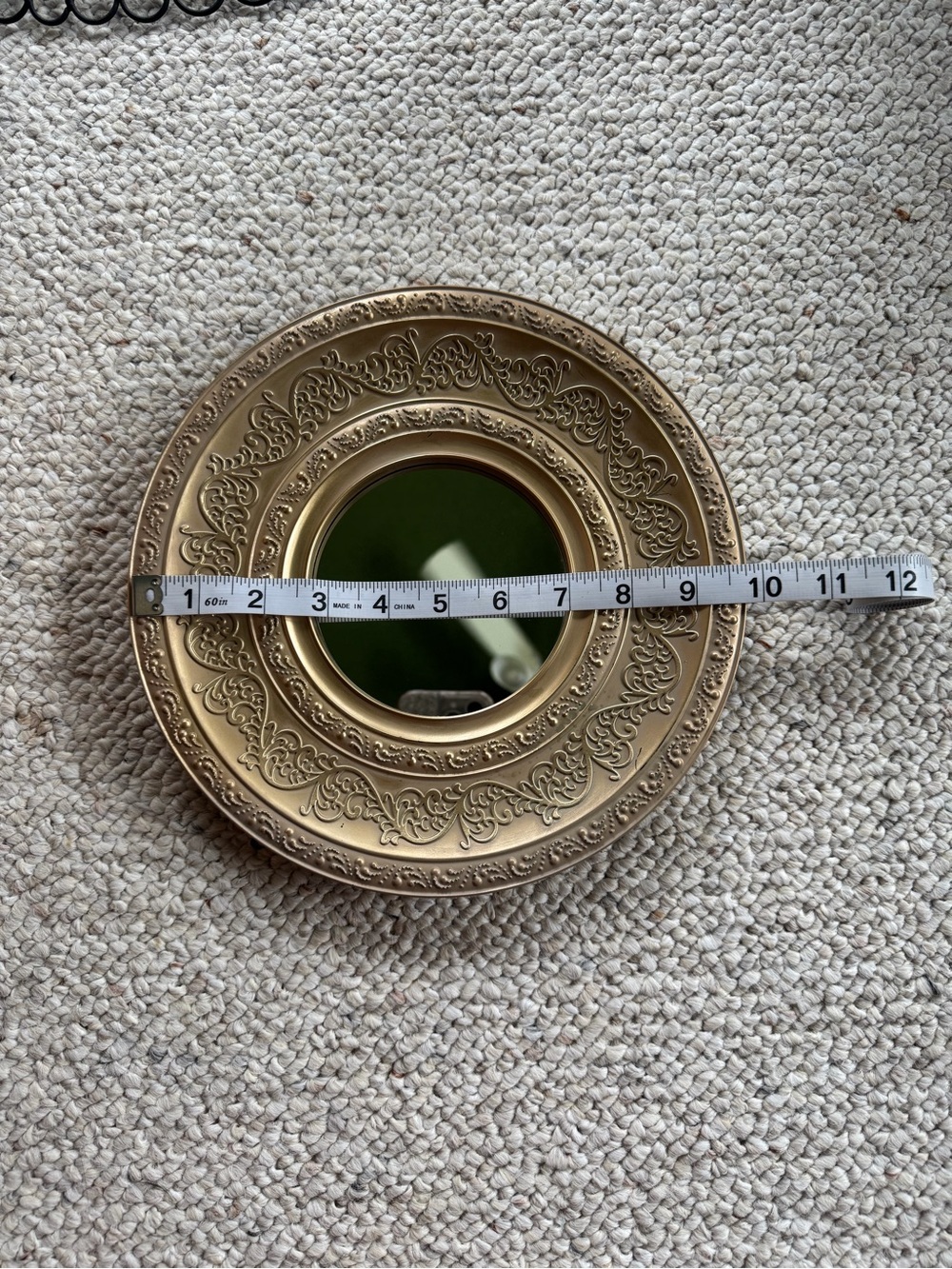 Plastic antique finish champagne colored VON CASA wall mirror